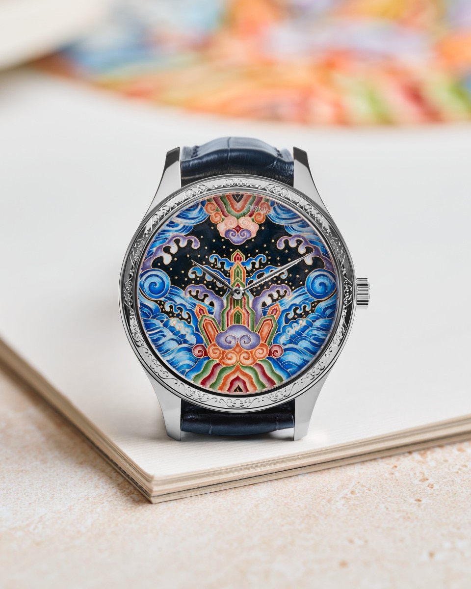 Vacheron Constantin watch with a colorful enamel dial featuring a symmetrical abstract design.
